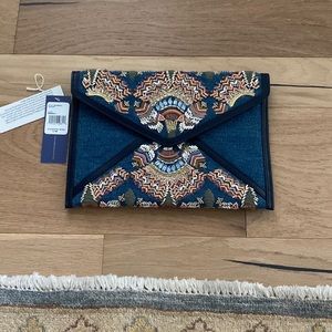 Denim embellished clutch. Brand new